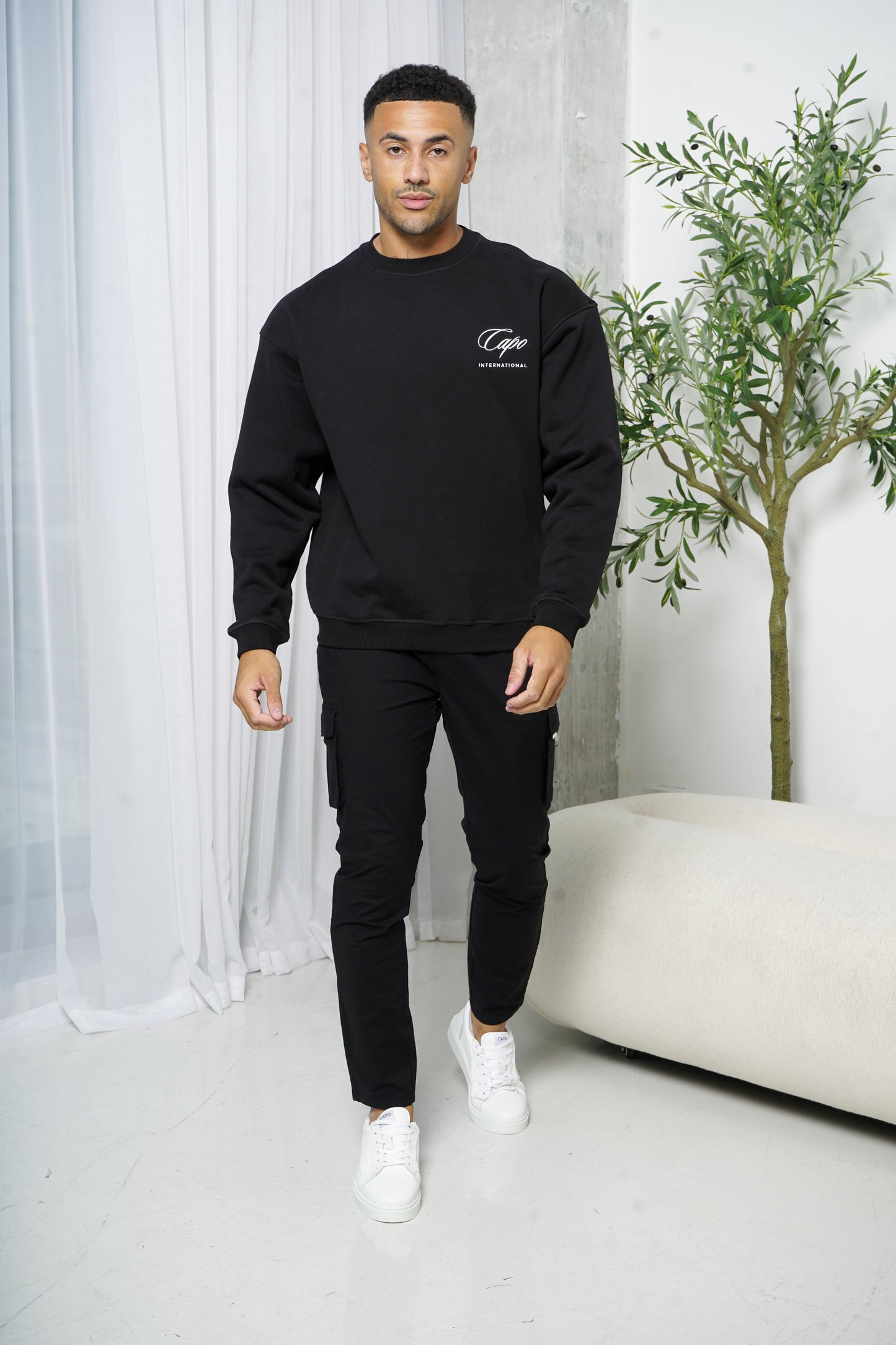 Capo International Sweater - Black